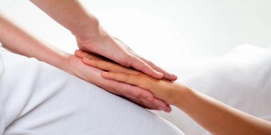 Hands holding gently care support healing